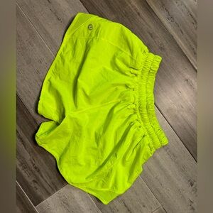 I am selling these size 0 neon yellow lululemon shorts.